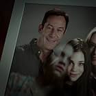 Mira Sorvino, Jason Isaacs, and India Eisley in Look Away (2018)