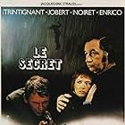 Jean-Louis Trintignant, Marlène Jobert, and Philippe Noiret in The Secret (1974)