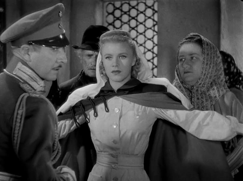 Ginger Rogers, Adrienne D'Ambricourt, and Roy D'Arcy in The Story of Vernon and Irene Castle (1939)