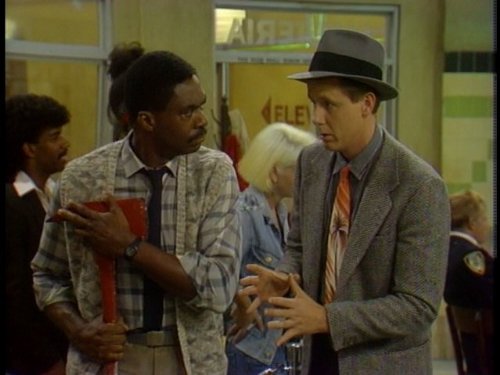 Harry Anderson and Charles Robinson in Night Court (1984)