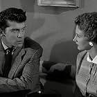 Rona Anderson and Lee Patterson in Spin a Dark Web (1956)