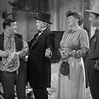 Bud Abbott, George Cleveland, Lou Costello, and Marjorie Main in The Wistful Widow of Wagon Gap (1947)