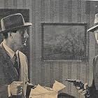 Clayton Moore and George Magrill in G-Men Never Forget (1948)