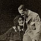 Betty Burbridge and Jon Junior in A Man's Work (1916)