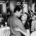 Olivia de Havilland and John Forsythe in The Ambassador's Daughter (1956)
