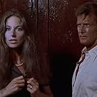 Roger Moore and Barbara Kellerman in The Sea Wolves (1980)