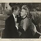 Evelyn Ankers and Franchot Tone in His Butler's Sister (1943)