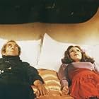 Marty Feldman and Louise Lasser in In God We Trust (or Gimme That Prime Time Religion) (1980)