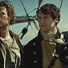 Benjamin Walker and Chris Hemsworth in In the Heart of the Sea (2015)