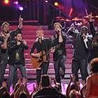 Bryan Adams, David Cook, David Hernandez, Chikezie Eze, David Archuleta, Michael Johns, and Jason Castro in American Idol (2002)
