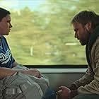 Max Riemelt and Tara Corrigan in Sleeping Dog (2023)