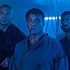 Sylvester Stallone, Jesse Metcalfe, and Dave Bautista in Escape Plan 2: Hades (2018)