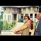 Patricia Arquette and U Aung Ko in Beyond Rangoon (1995)