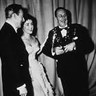 Elizabeth Taylor, second husband Michael Wilding and Walt Disney at the Academy Awards