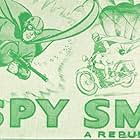 Marguerite Chapman, Kane Richmond, and Hans Schumm in Spy Smasher (1942)