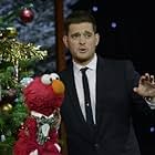 Michael Bublé, Kevin Clash, and Elmo in Michael Bublé: Home for the Holidays (2012)