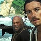 Lee Arenberg and Orlando Bloom in Pirates of the Caribbean: Dead Man's Chest (2006)