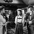 Errol Flynn, Ida Lupino, and Eleanor Parker in Escape Me Never (1947)