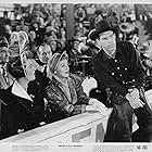 Irene Dunne, Jacqueline deWit, Fred MacMurray, and Philip Ober in Never a Dull Moment (1950)