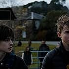 Maxwell Jenkins and Jaeden Martell in Arcadian (2024)