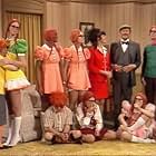 Henry Gibson, Lily Tomlin, Ruth Buzzi, Teresa Graves, Coslough Johnson, Dick Martin, Inga Neilsen, Pamela Rodgers, Dan Rowan, and Jo Anne Worley in Rowan & Martin's Laugh-In (1967)