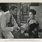 Charles Korvin and Merle Oberon in Temptation (1946)