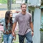 Jordana Brewster and Paul Walker in Fast Five (2011)