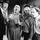 Moe Howard, Larry Fine, Ted Healy, and Curly Howard in Dancing Lady (1933)