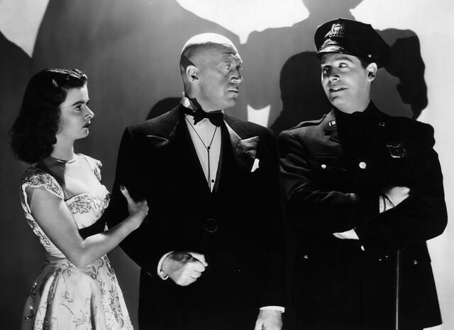 Joan Bennett, Milton Berle, and Otto Preminger in Margin for Error (1943)