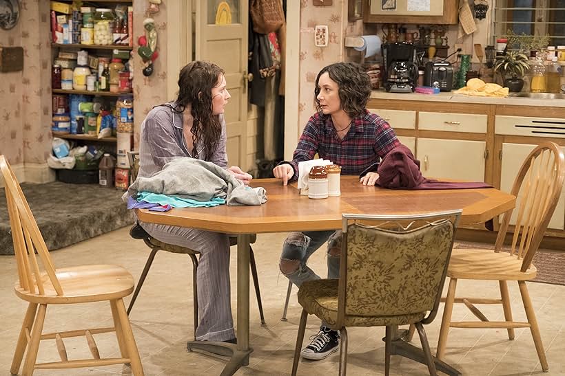 Sara Gilbert and Emma Kenney in Roseanne (1988)