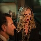 Toni Collette and Bradley Cooper in Nightmare Alley (2021)