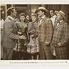 Ward Bond, Laird Cregar, Alice Faye, June Havoc, Jack Oakie, Frank Orth, and John Payne in Hello Frisco, Hello (1943)