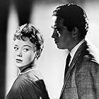 John Gregson and Glynis Johns in Young and Willing (1954)