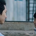 Alan Kim and Steven Yeun in Minari (2020)