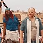 Louis C.K., Pete Davidson, and Leslie Jones in Rooftop Party (2015)