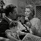 Brian Donlevy, Muriel Angelus, Donnie Kerr, and Joyce Arleen in The Great McGinty (1940)