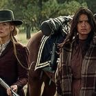 Q'orianka Kilcher, Rosamund Pike, Tanaya Beatty, and Xavier Horsechief in Hostiles (2017)