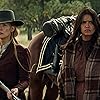 Q'orianka Kilcher, Rosamund Pike, Tanaya Beatty, and Xavier Horsechief in Hostiles (2017)