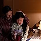 Noel Cho and Han Ye-ri in Minari (2020)