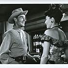 Randolph Scott and Marie Windsor in The Bounty Hunter (1954)