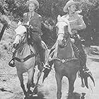 Roy Rogers, Penny Edwards, and Trigger in Spoilers of the Plains (1951)