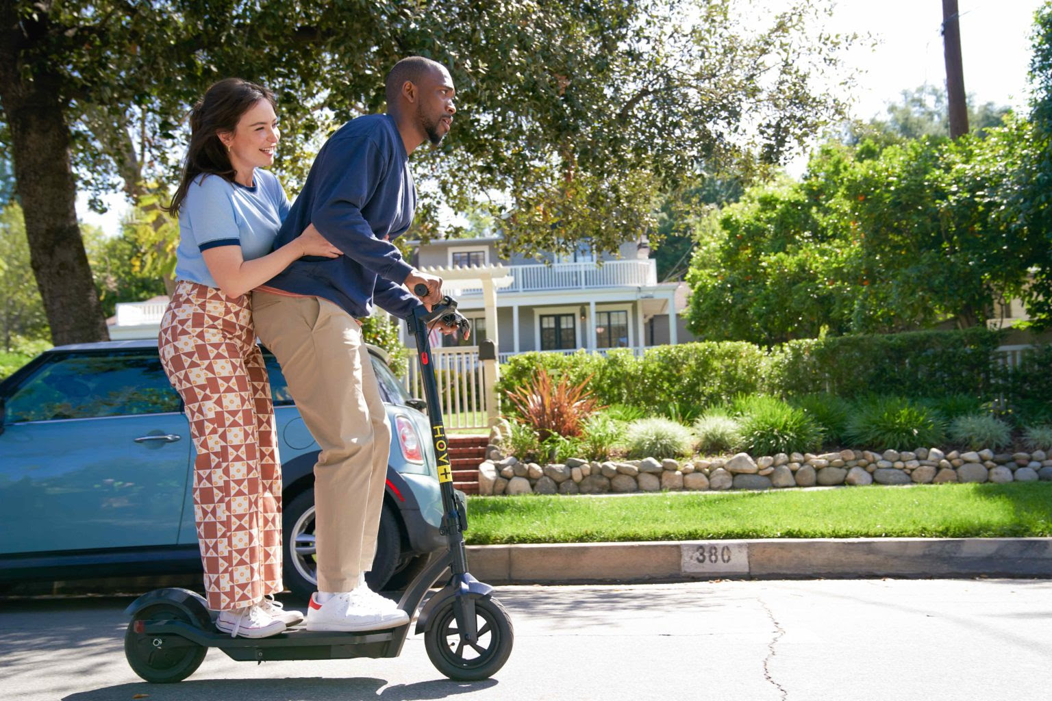 Milana Vayntrub and Jay Pharoah in Out of Office (2022)