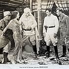 Myrna Loy, Noah Beery, Warner Baxter, George Cooper, and Gregory Gaye in Renegades (1930)