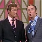 Roger Moore and Dick Martin in Rowan & Martin's Laugh-In (1967)