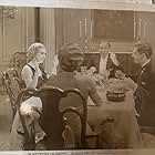 Mary Astor, George Arliss, William Janney, and Evalyn Knapp in A Successful Calamity (1932)