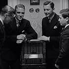 Robert Young, William T. Orr, Gene Reynolds, and Robert Stack in The Mortal Storm (1940)