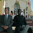 Guy Pearce and Eriq Ebouaney in Domino (2019)