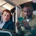 Idris Elba and Harry Michell in Hijack (2023)