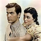 Jeffrey Hunter and Constance Smith in Lure of the Wilderness (1952)