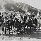 Iron Eyes Cody, Dick Botiller, Frank Bruno, Dick Foran, Carlyle Moore Jr., Artie Ortego, Jim Thorpe, and Smoke in Treachery Rides the Range (1936)